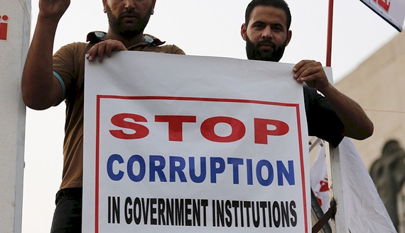 الرشوة والفساد ينخران في المجتمع والدولة في العراق