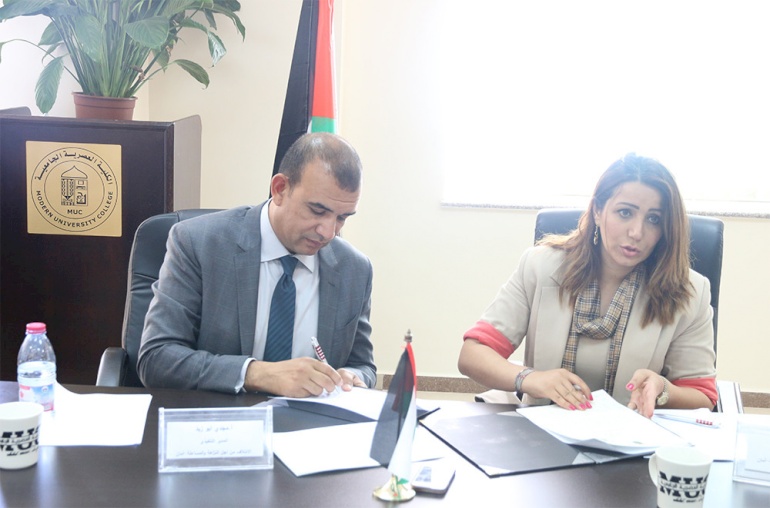 اتفاقية تعاون مشترك بين الكلية العصرية الجامعية و أمان